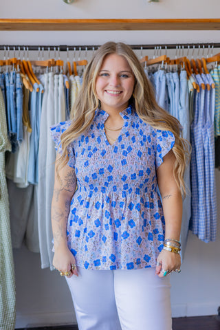 Ruffle Sleeveless Floral Blouse